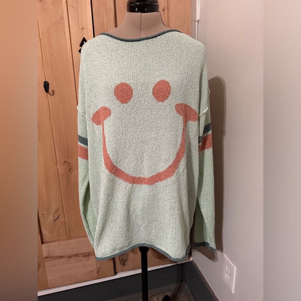 Mint Green Smiley Crew Neck Sweater with Peach Accent